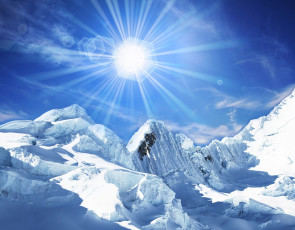عکس خورشید و کوهستان برفی