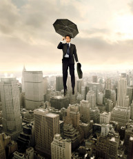 عکس مرد با چتر در آسمان